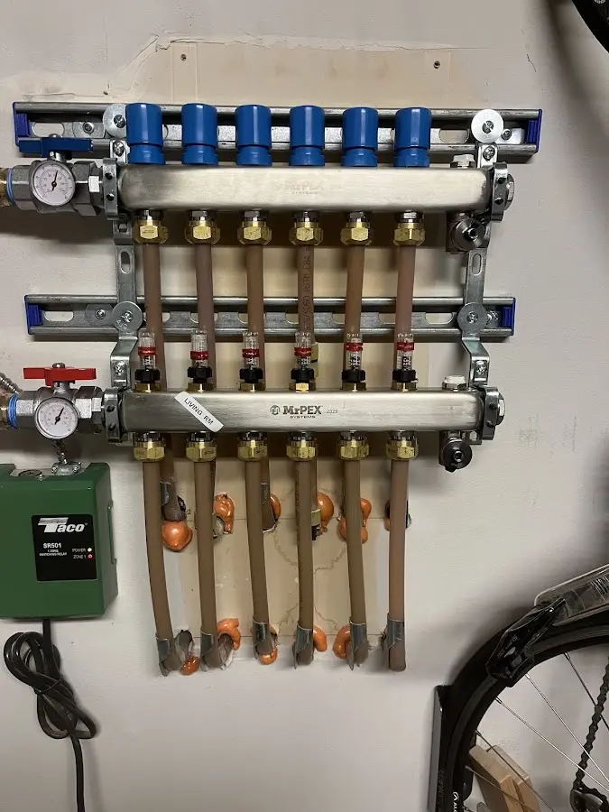 Plumber performing Leak Detection at a residential property in Mendon